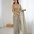 beige color silk blend  bollywood style glamorous ceremonial saree