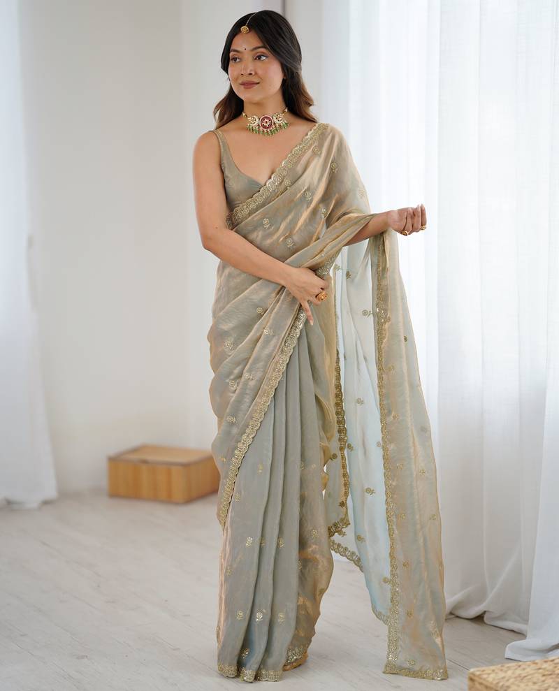 beige color silk blend  bollywood style glamorous ceremonial saree