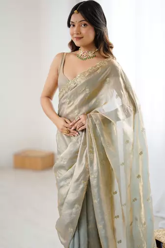 beige color silk blend  bollywood style glamorous ceremonial saree