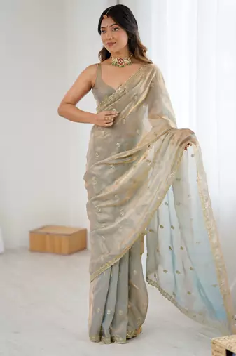 beige color silk blend  bollywood style glamorous ceremonial saree