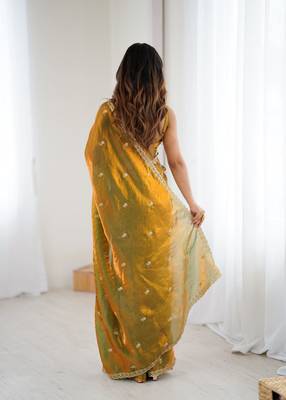 gold color silk blend  bollywood style glamorous ceremonial saree 2