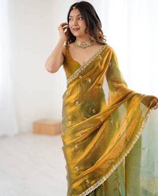 gold color silk blend  bollywood style glamorous ceremonial saree 3