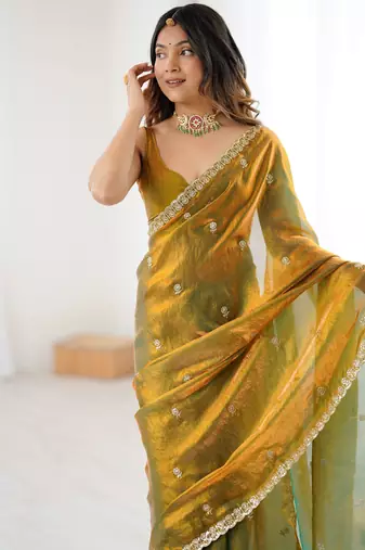 gold color silk blend  bollywood style glamorous ceremonial saree