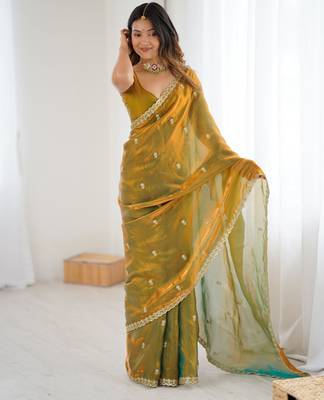 gold color silk blend  bollywood style glamorous ceremonial saree 4