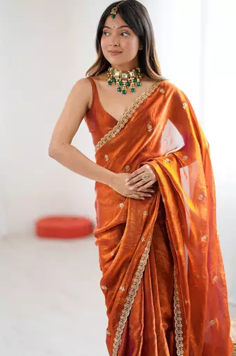 orange color silk blend  bollywood style glamorous ceremonial saree