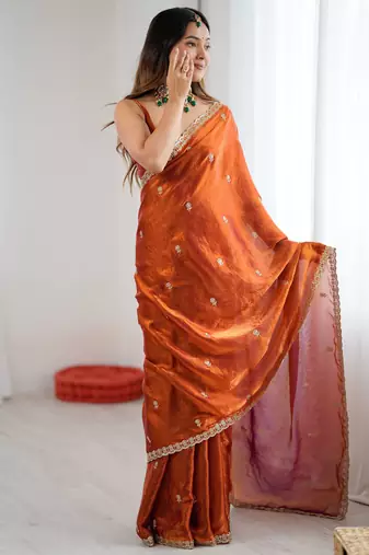 orange color silk blend  bollywood style glamorous ceremonial saree