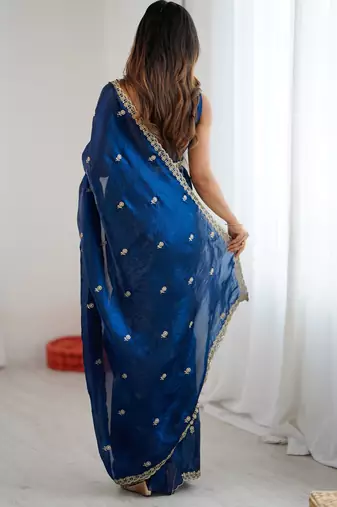 teal color silk blend  bollywood style glamorous ceremonial saree