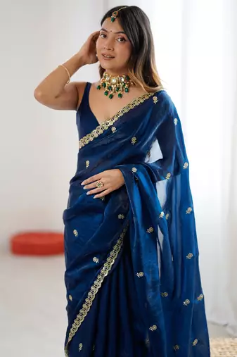 teal color silk blend  bollywood style glamorous ceremonial saree