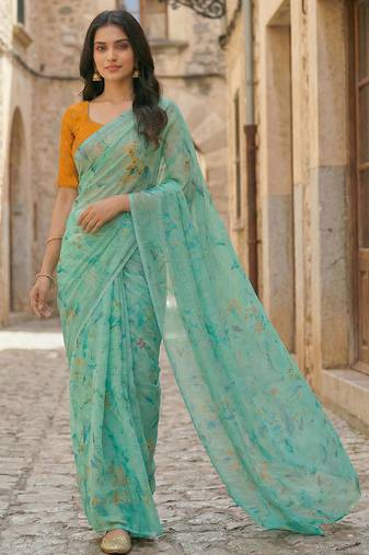 sea green color organza smart printed saree with embroidered blouse