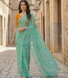 sea green color organza smart printed saree with embroidered blouse