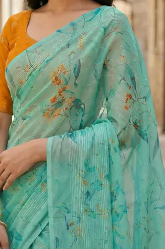 sea green color organza smart printed saree with embroidered blouse