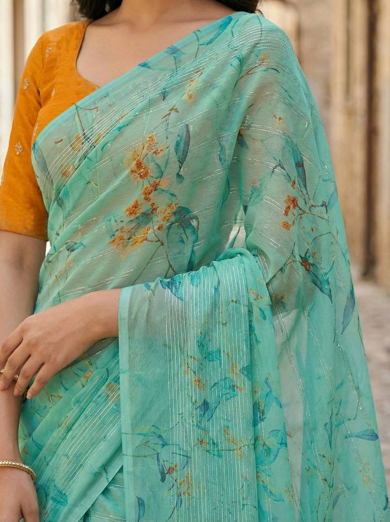 sea green color organza smart printed saree with embroidered blouse
