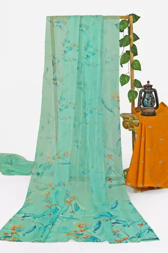 sea green color organza smart printed saree with embroidered blouse
