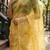 mustard color organza smart printed saree with embroidered blouse