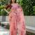peach color organza smart printed saree with embroidered blouse
