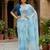 sky blue color organza smart printed saree with embroidered blouse