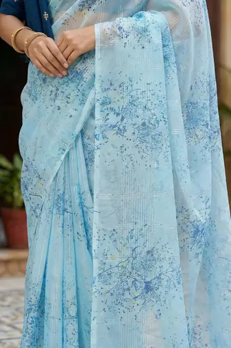 sky blue color organza smart printed saree with embroidered blouse