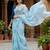 sky blue color organza smart printed saree with embroidered blouse