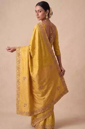 yellow color banarasi silk blend saree for beautiful show stopper wedding looks