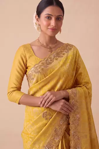 yellow color banarasi silk blend saree for beautiful show stopper wedding looks