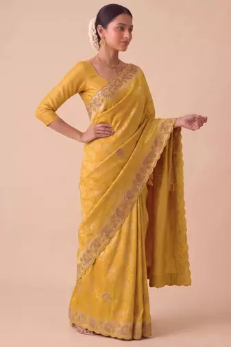 yellow color banarasi silk blend saree for beautiful show stopper wedding looks