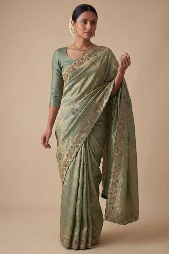 sea green color banarasi silk blend saree for beautiful show stopper wedding looks