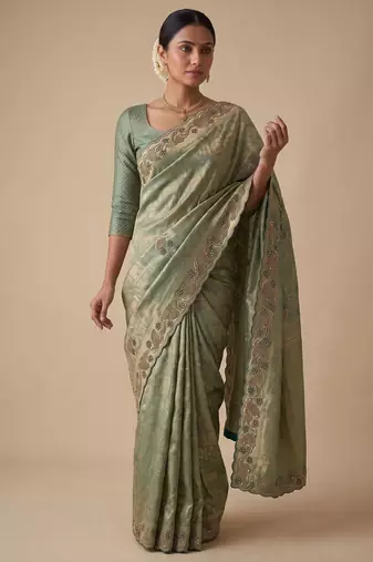 sea green color banarasi silk blend saree for beautiful show stopper wedding looks