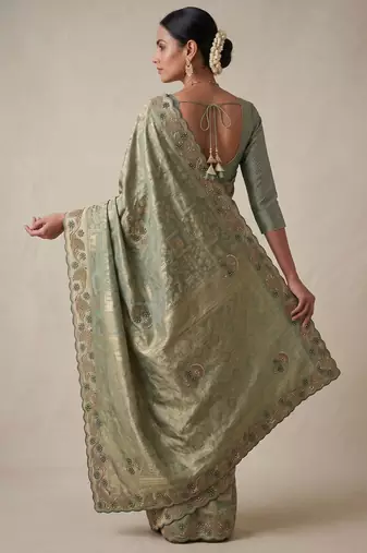sea green color banarasi silk blend saree for beautiful show stopper wedding looks