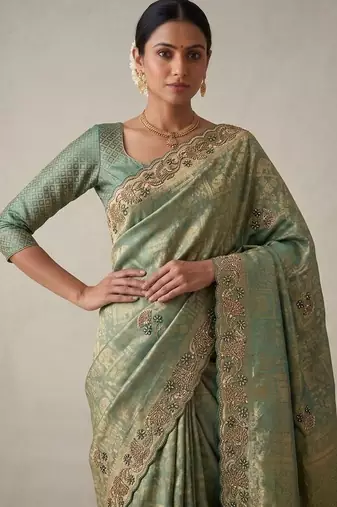 sea green color banarasi silk blend saree for beautiful show stopper wedding looks