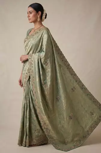 sea green color banarasi silk blend saree for beautiful show stopper wedding looks