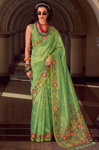 green color smart floral embroidered tissue saree for festive looks