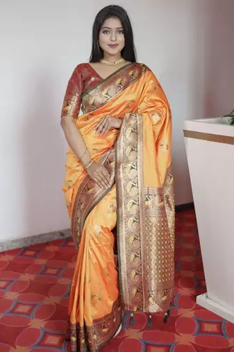 Yellow  banarasi silk blend saree with paithani rich weaved pallu and blouse