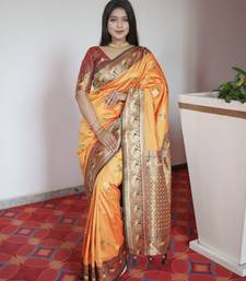Yellow  banarasi silk blend saree with paithani rich weaved pallu and blouse