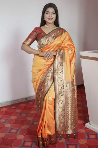 Yellow  banarasi silk blend saree with paithani rich weaved pallu and blouse