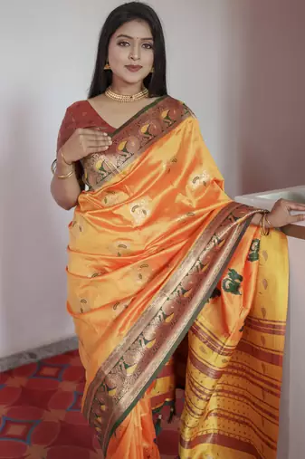 Yellow  banarasi silk blend saree with paithani rich weaved pallu and blouse