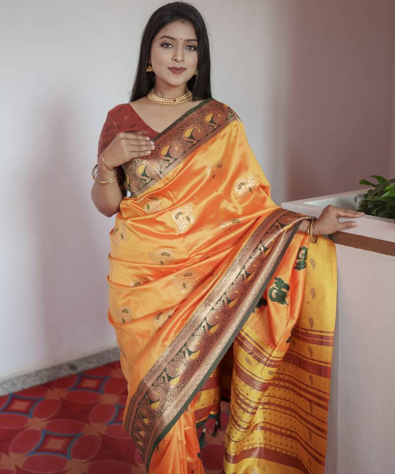 Yellow  banarasi silk blend saree with paithani rich weaved pallu and blouse