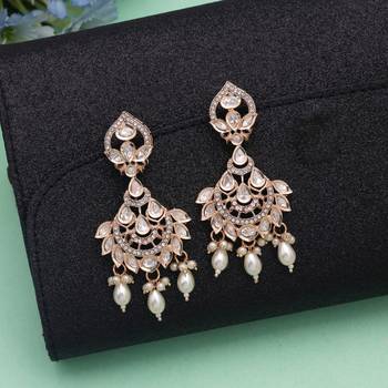 White color polki kundan earrings bridal jewelry design 1