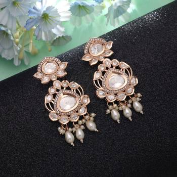 White color american diamond earrings party wear design 1