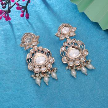 White color american diamond earrings party wear design 2