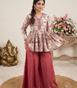 Rust red floral printed peplum kurti with matching flared palazzo set