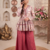 Rust red floral printed peplum kurti with matching flared palazzo set