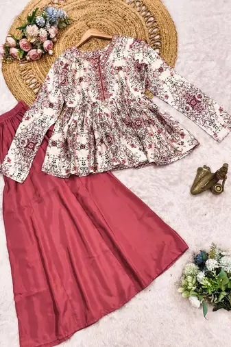 Rust red floral printed peplum kurti with matching flared palazzo set