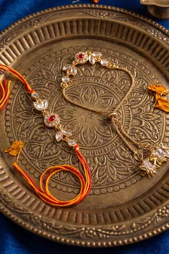 set of 2 kundan studded gold toned bhaiya bhabhi rakhi with roli chawal chandan mishri