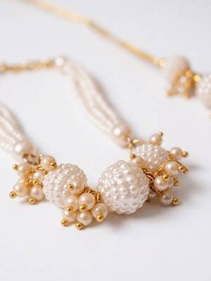 set of 2 gold toned & white pearls bhaiya bhabhi rakhi with roli chawal chandan mishri 4