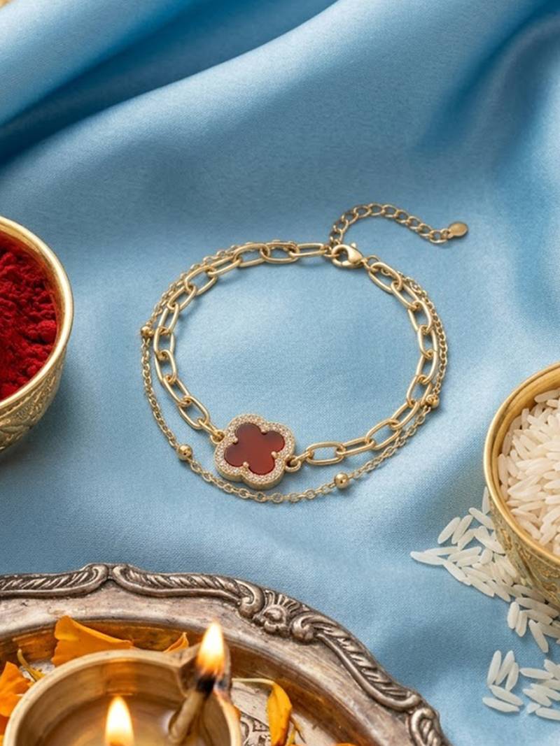 women artrificial stones gold plated rakhi with roli chawal chandan mishri