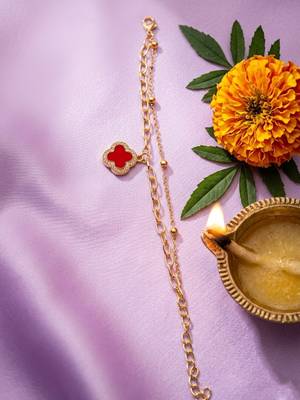 women artrificial stones gold plated rakhi with roli chawal chandan mishri 2