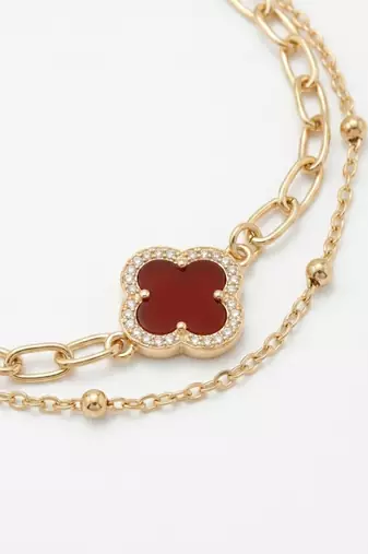 women artrificial stones gold plated rakhi with roli chawal chandan mishri