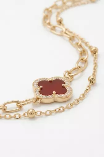 women artrificial stones gold plated rakhi with roli chawal chandan mishri