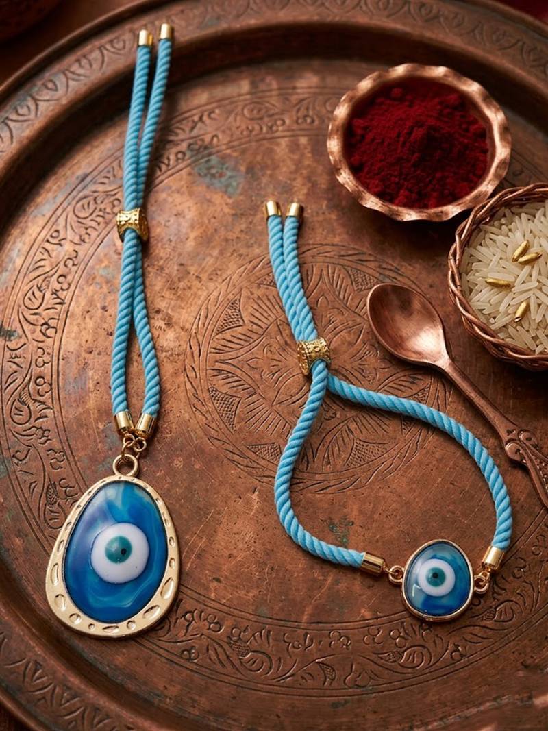 set of 2 blue evil eye bhaiya bhabhi wraparound rakhi with roli chawal chandan mishri