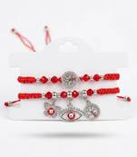 set of 2 red & silver evil eye design bhaiya bhabhi rakhi with roli chawal chandan